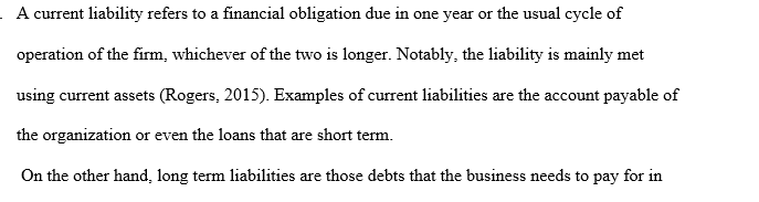 What differentiates a current liability from a long-term liability