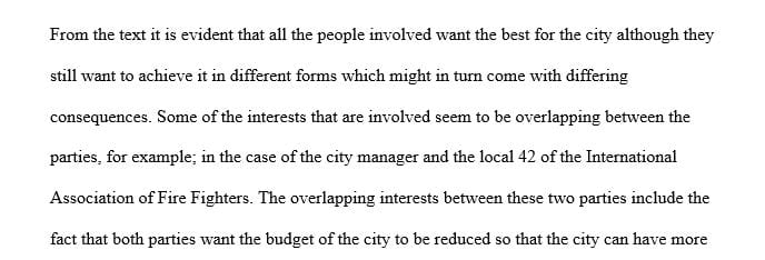 Identify the overlapping interests of the city manager and the Local 42 of the International Association of Fire Fighters.