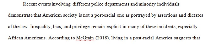 Find an example from the news that challenges the idea that we live in a post-racial society.