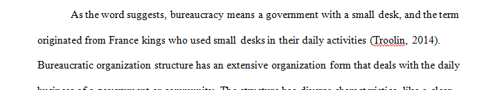 What are the attributes of a bureaucratic organizational structure
